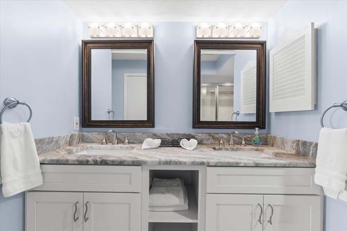 bright dining area with bay views inside Bayview Beauty Siesta Key