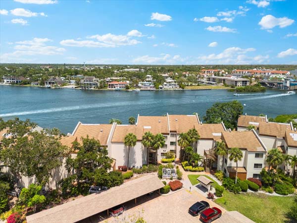 guest bedroom with queen and twin bed inside Siesta Key condo