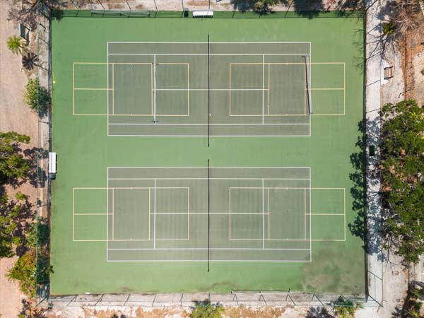primary king bedroom with ensuite bath inside Siesta Key condo