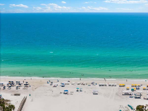 guest room with queen and twin bed suited for families in Siesta Key